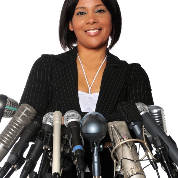 African american Woman behind microphones isolated over a qhite background