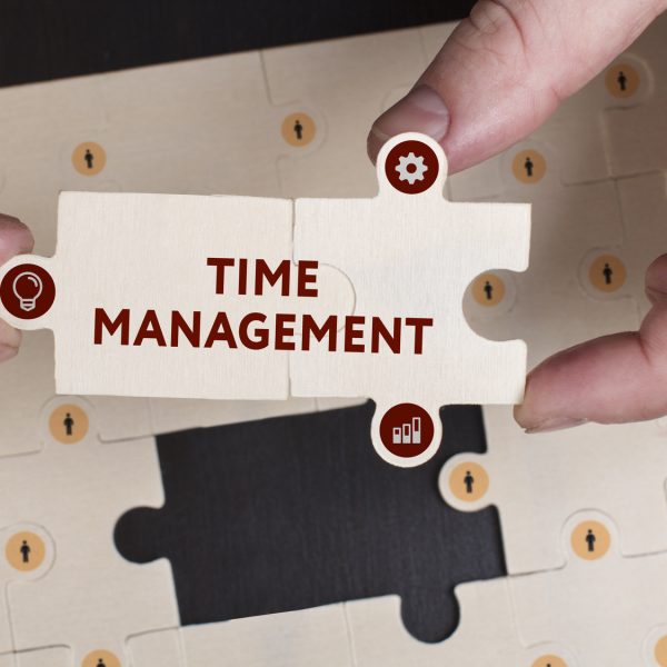 Business, Technology, Internet and network concept. Young businessman shows the word: Time management