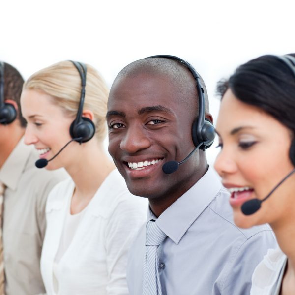 Competitive business people working in a call center in the office