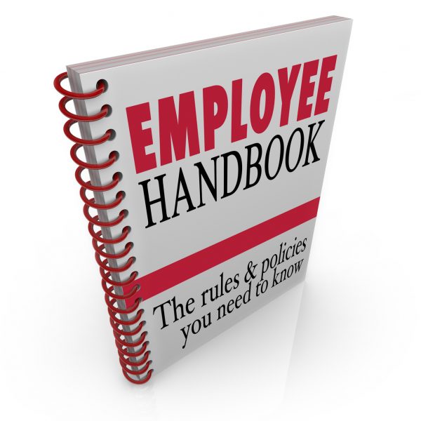Employee Handbook words on a book cover to illustrate policies, rules, code of conduct, guidelines or other important instructions or protocols to follow on the job at work