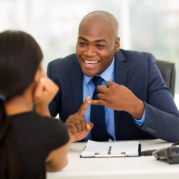 friendly african american businessman meeting with client